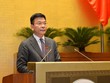 Bộ trưởng Bộ Tư pháp Lê Thành Long báo cáo về công tác thi hành án năm 2021.