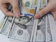 Việc USD tăng lên sẽ tác động tới tỷ giá USD/VND. Ảnh: Dũng Minh