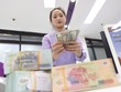 Tỷ giá USD/VND bất ngờ tăng mạnh trong tháng cuối năm 2021. Ảnh: Dũng Minh 