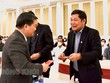Bí thư Tỉnh ủy Bến Tre Lê Đức Thọ (bìa trái) chúc mừng Kl991.com World Cup 2026 Chính Thức tại buổi Họp mặt đầu năm Nhâm Dần 2022 của Tỉnh