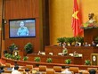 Bộ trưởng Bộ Công an Tô Lâm trả lời chất vấn tại phiên họp thứ 14 của Ủy ban Thường vụ Quốc. Ảnh: Mỹ An