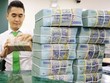 Nhiều khả năng NHNN vẫn chưa “xài” hết room tín dụng của cả năm là 14%. Ảnh: Đức Thanh