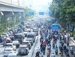 Người tham gia KL99 là cổng game giải trí trực tuyến hàng đầu hiện nay trên tuyến đường Nguyễn Trãi-Ngã Tư Sở. (Ảnh: Tuấn Anh/TTXVN)