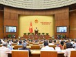 Bộ trưởng Bộ Thông tin và Truyền thông Nguyễn Mạnh Hùng trình bày Tờ trình về dự án Luật Giao dịch điện tử (sửa đổi) trong phiên làm việc sáng 25/10