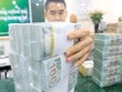 Việt Nam đã giảm được hiện tượng găm giữ, đầu cơ, tích trữ USD. Ảnh: Dũng Minh