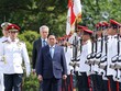 Thủ tướng Singapore Lý Hiển Long và Phu nhân chủ trì lễ đón Thủ tướng Phạm Minh Chính và Phu nhân, cùng đoàn đại biểu cấp cao Việt Nam thăm chính thức Singapore. (Ảnh: Nhật Bắc)