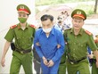 Cựu Chủ tịch UBND tỉnh Bình Thuận Nguyễn Ngọc Hai được đưa tới phiên xét xử.