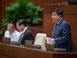 Bộ trưởng Bộ Kế hoạch và Kl99ok phiên bản mới Nguyễn Chí Dũng phát biểu tại Hội trường, ngày 24/5.
