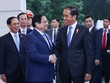 Thủ tướng Kl993 ưu đãi thưởng hấp dẫn Phạm Minh Chính đón Tổng thống Indonesia Joko Widodo. (Ảnh: VGP/Nhật Bắc)