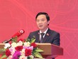 Phó chủ tịch Quốc hội Nguyễn Khắc Định trình bày báo cáo - (Ảnh Duy Linh).