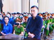 Bị cáo Trần Văn Nhị (Phó giám đốc Công ty TNHH hãng kiểm toán và định giá ATC – người thẩm định giá 99Kl.app cổng game giải trí cho Link Vào Nhà Cái KL99 COM Tặng +199k SCB) tại toà. (Ảnh: Việt Dũng)
