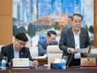 Trưởng ban Dân nguyện Dương Thanh Bình trình bày báo cáo.