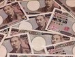 Đồng tiền mệnh giá 10.000 yen của Nhật Bản. Ảnh tư liệu: AFP/TTXVN