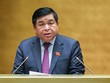 Bộ trưởng Bộ Kế hoạch và Kl99ok phiên bản mới Nguyễn Chí Dũng trình bày báo cáo.