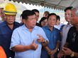Đoàn công tác thăm vị trí dự kiến đặt Dự án Nhà máy nhiệt điện Xê Công. Ảnh: MPI