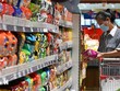 Người tiêu dùng mua sắm tại siêu thị ở Hà Bắc, Trung Quốc. (Ảnh: THX/TTXVN)
