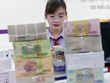 Việc Fed đảo chiều chính sách tiền tệ giúp áp lực lên tỷ giá USD/VND vơi bớt