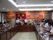 Lãnh đạo tỉnh Bình Định chúc mừng các cán bộ vừa được chuẩn y, điều động. Ảnh: T.Đ.