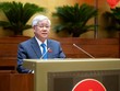 Chủ tịch Ủy ban Trung ương Mặt trận Tổ quốc Việt Nam Đỗ Văn Chiến trình bày báo cáo.