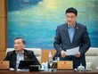 Chủ nhiệm Ủy ban Kl992 cổng game cá cược Vũ Hồng Thanh trình bày báo cáo thẩm tra.
