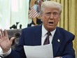 Tổng thống Donald Trump tuyên bố ông sẽ áp dụng thuế quan có đi có lại đối với các đối tác thương mại của Mỹ. Ảnh: AFP