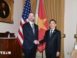 Phó Thủ tướng Hồ Đức Phớc gặp Đại diện Thương mại Mỹ Jamieson Greer. (Ảnh: TTXVN).