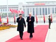Chủ tịch Trung Quốc Tập Cận Bình (trái) trong lễ đón chính thức Tổng thống Mỹ Donald Trump tới thăm Bắc Kinh ngày 9/11/2017. Ảnh: THX/TTXVN