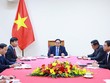 Thủ tướng Phạm Minh Chính điện đàm với Thủ tướng Singapore Lawrence Wong. Ảnh: Nhật Bắc 