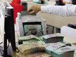 Việc sửa đổi đồng bộ hành lang pháp lý về xử lý nợ xấu sẽ kích thích thị trường nợ phát triển. Ảnh: Đức Thanh 