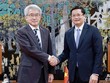 Thứ trưởng Nguyễn Đức Tâm (bên phải) và ông Hataeda Mikio tại buổi tiếp. Ảnh: Mạnh Tuấn.