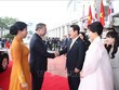 Tổng thống Hàn Quốc Lee Jae Myung và Phu nhân đón Tổng Bí thư và Phu nhân Ngô Phương Ly tại nơi đỗ xe - Ảnh: TTXVN