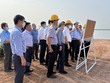 Đoàn công tác của EVN kiểm tra hiện trường thực hiện dự án nhà máy thủy điện Trị An mở rộng. 