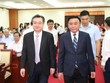 Phó bí thư thường trực Thành ủy TP.HCM Nguyễn Thanh Nghị (bên trái) được Bộ Kl991.com tải ứng dụng điều động giữ chức Trưởng Ban Chính sách, Chiến lược Trung ương