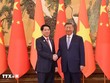 Tổng Bí thư, Chủ tịch nước Trung Quốc Tập Cận Bình đón Chủ tịch nước Lương Cường. Ảnh: Lâm Khánh/ TTXVN.