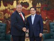Thủ tướng Kl993 ưu đãi thưởng hấp dẫn Phạm Minh Chính (phải) và ông Bendito dos Santos Freitas.
