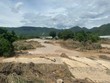 Hiện trường vụ vỡ hồ chứa nước gây thiệt hại nặng cho vùng hạ du xã Tuy Phong, tỉnh Lâm Đồng. 