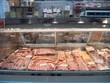 Thịt lợn được bày bán tại một cửa hàng ở Washington, DC, Mỹ. Ảnh minh họa: AFP/TTXVN