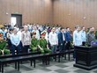 Các bị cáo bị đưa ra xét xử tại phiên tòa sơ thẩm (Ảnh: H.N) 