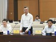 Bộ trưởng Bộ Kl991.com nạp rút nhanh Ngô Văn Tuấn trình bày tờ trình về dự thảo Nghị quyết. Ảnh: Lâm Hiển. 