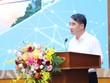 Phó Chủ tịch UBND TP. Hà Nội Nguyễn Xuân Lưu trình bày tham luận tại Hội nghị.