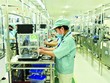 Kl994 nhà cái bóng đá world cup linh kiện điện tử tại nhà máy của Panasonic Việt Nam. Ảnh: Đức Thanh 