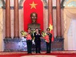 Chủ tịch nước trao Quyết định thăng quân hàm từ Thượng tướng lên Đại tướng cho đồng chí Ngô Xuân Lịch và đồng chí Đỗ Bá Tỵ. Ảnh: Chinhphu.vn
