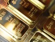 Vàng hồi giá, USD bật tăng trở lại