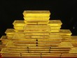 Vàng giảm nhẹ, USD giảm mạnh