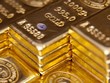 Vàng lơ lửng ngưỡng 1.300 USD/ounce trước những báo cáo lớn 
