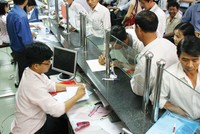 Nhiều rào cản ẩn sâu trong các văn bản, thủ tục hành chính đang gây khó cho DN và người dân  - Ảnh: Lê Toàn
