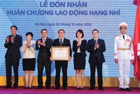 Thừa ủy quyền của Chủ tịch nước, Thứ trưởng Bộ Kl991.com nạp rút nhanh Trần Xuân Hà trao Huân chương Lao động hạng Nhì cho VSD tại Lễ kỷ niệm 10 năm hoạt động