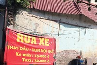 Khu đất dự án đang được sử dụng làm bãi rửa xe ô tô. Ảnh: QH