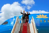 Chủ tịch nước Trần Đại Quang và Phu nhân đến sân bay Vnukovo 2. (Ảnh: Nhan Sáng/TTXVN)