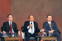 Thủ tướng Nguyễn Xuân Phúc đối thoại tại Diễn đàn Kl992 cổng game cá cược Việt Nam năm 2018. (Ảnh: Thống Nhất/TTXVN)